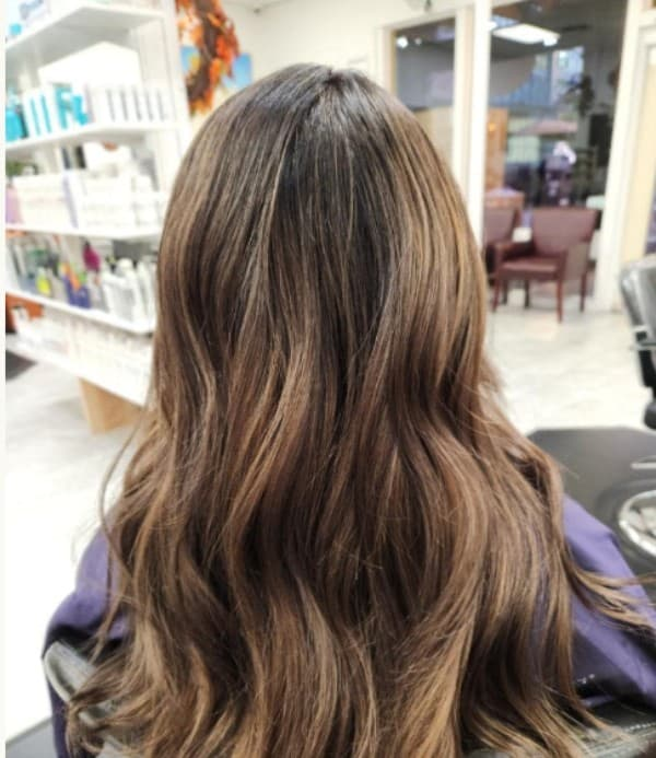 Rich, lived-in hair color by Creative Hair & Spa